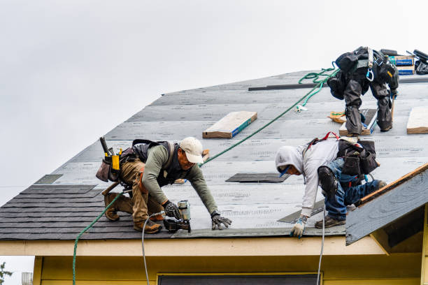 Professional Roofing technician working in Slovan, PA